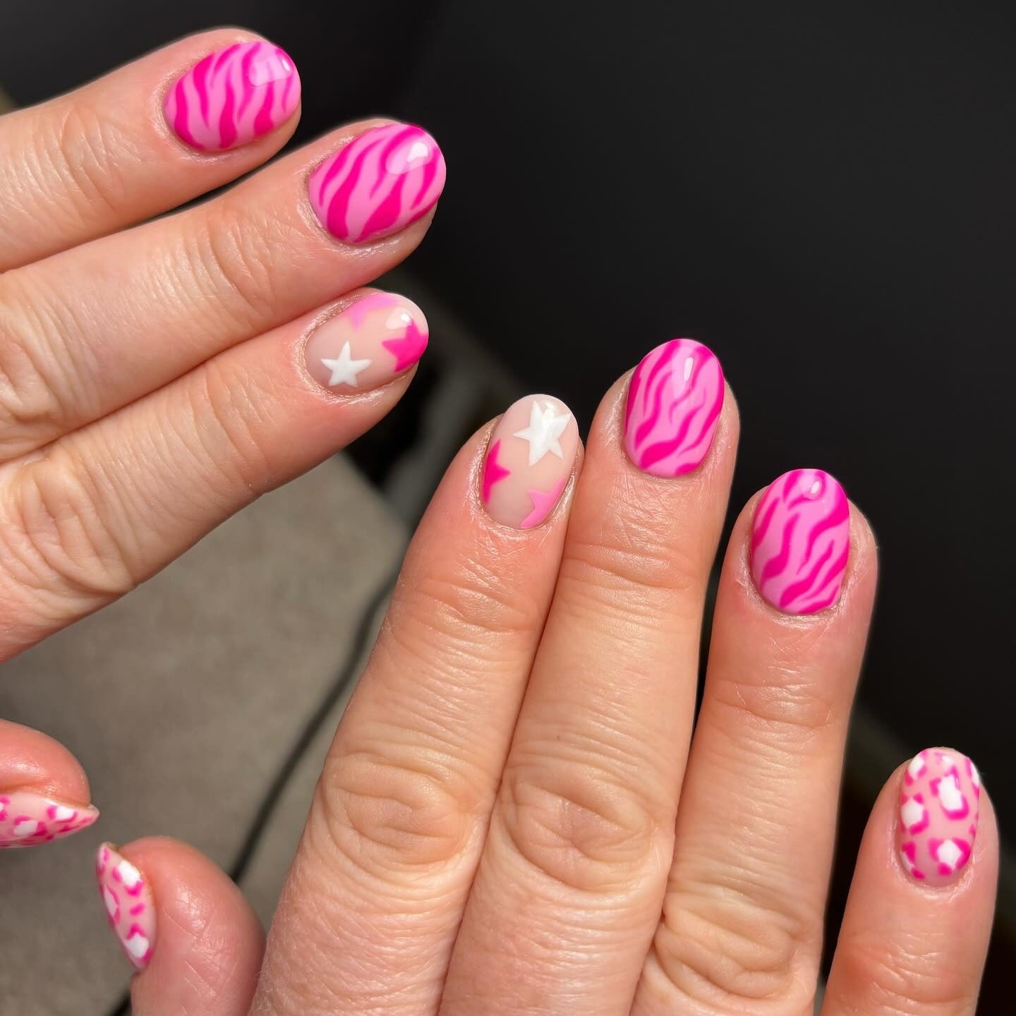 7. Zebra Print and Neon Stars (Short Nail Ideas)