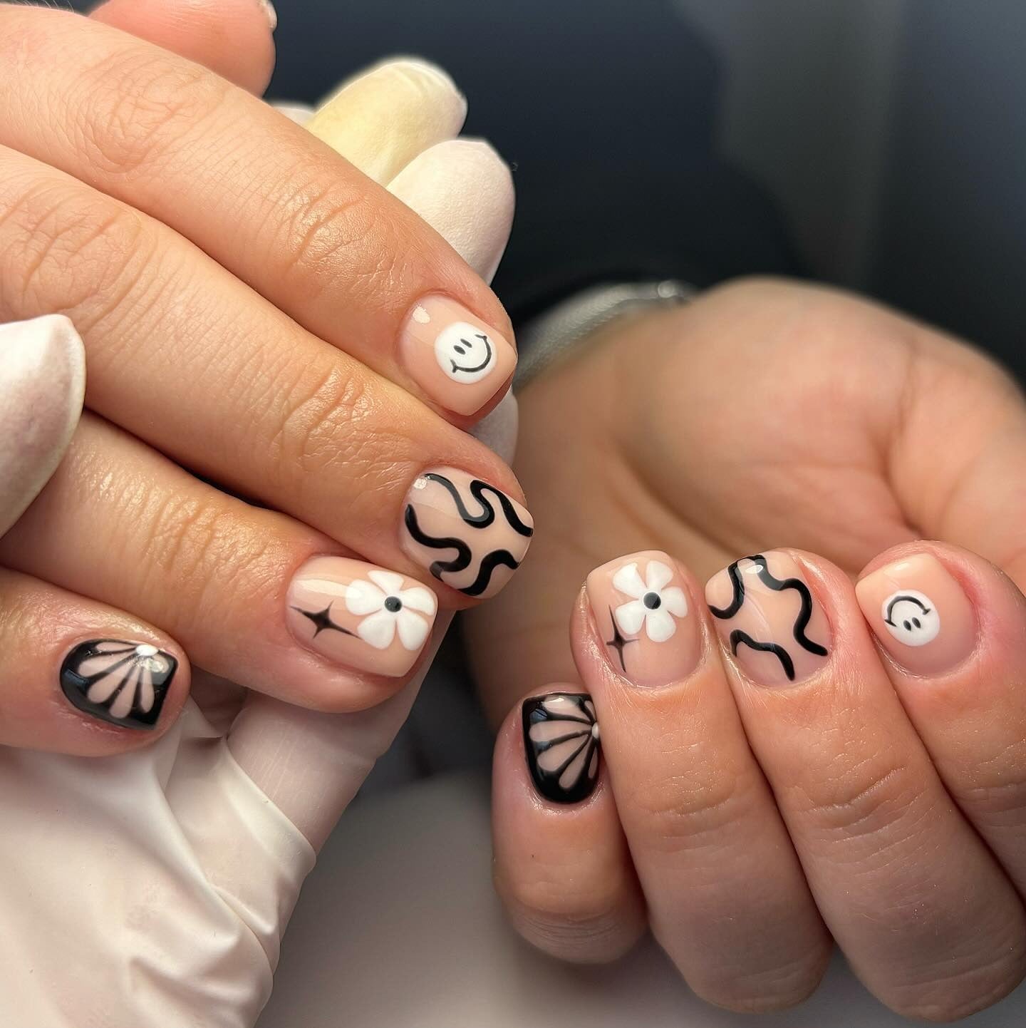 14. Monochrome Doodles and Blooms (Short Nail Ideas)
