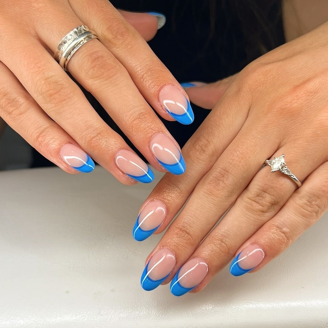 7. Classic Cobalt French Outline (Blue Spring Nail Ideas)