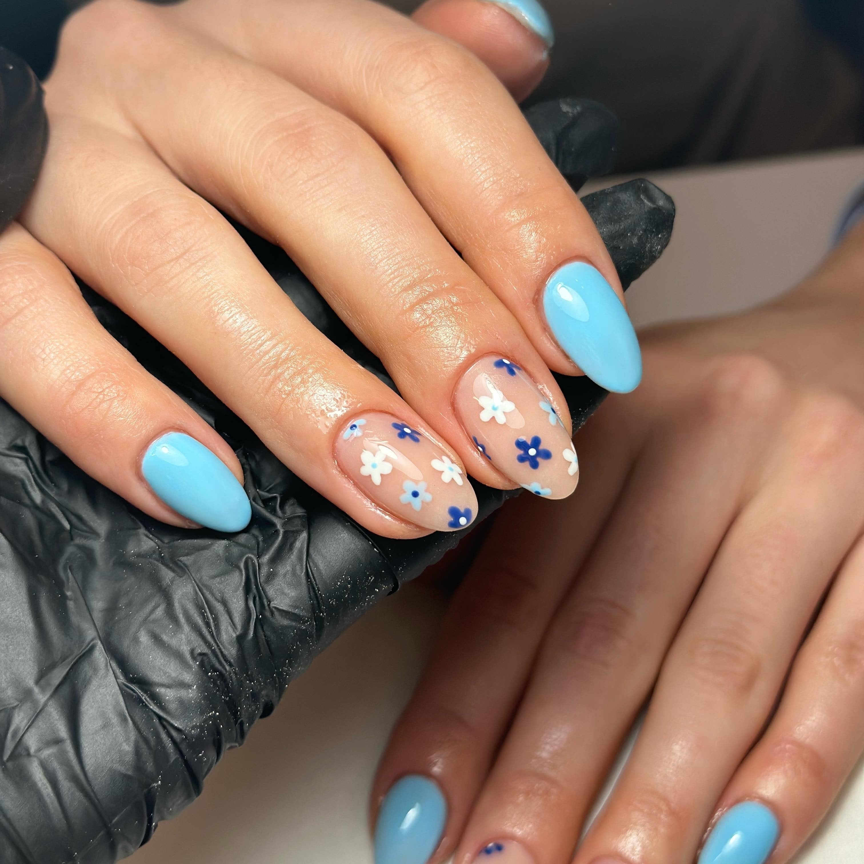 9. Blue Blossoms on Transparent Canvas (Blue Spring Nail Ideas)