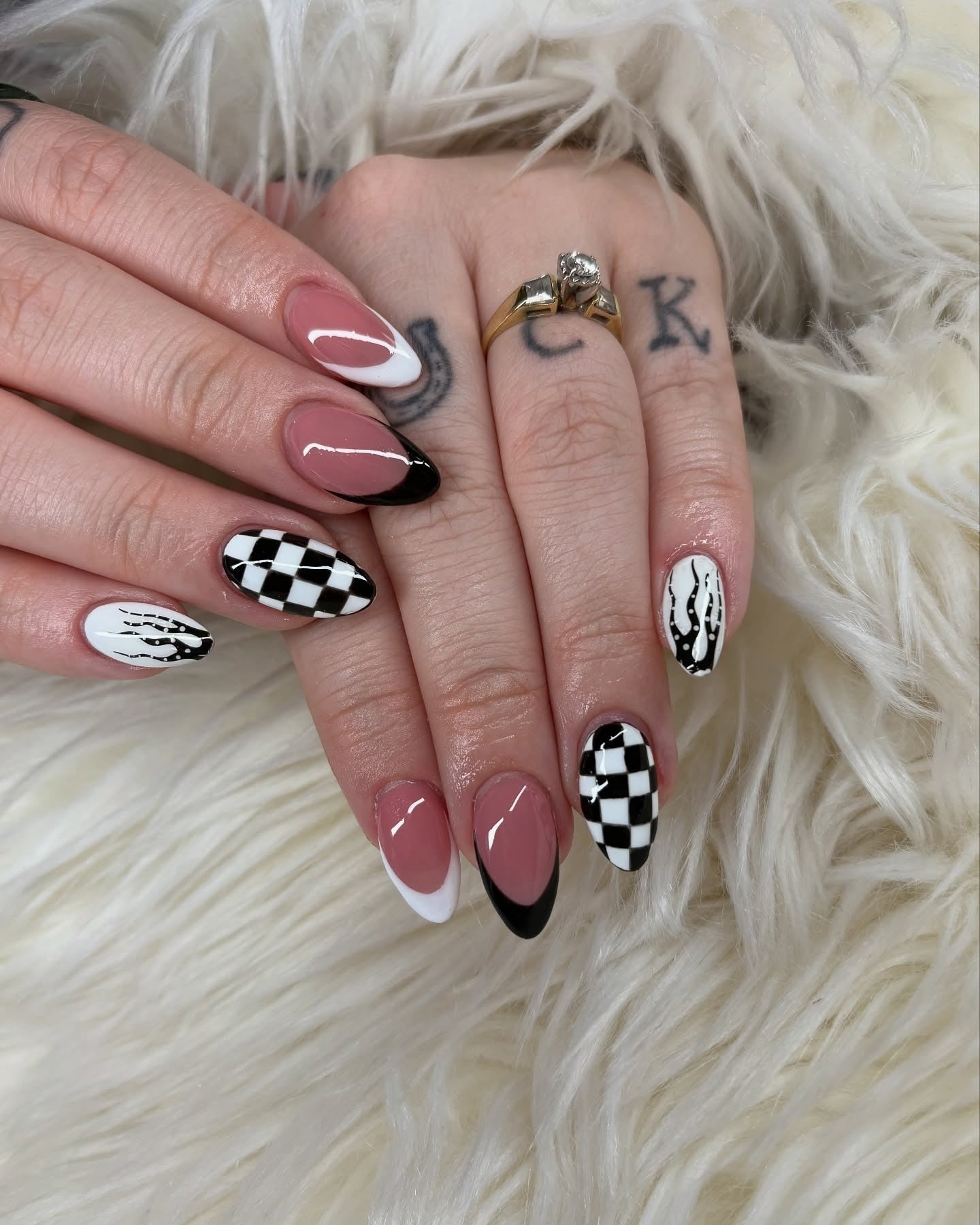 2. Checkerboard Contrast Meets Edgy Tips (Black and White Nail Ideas)