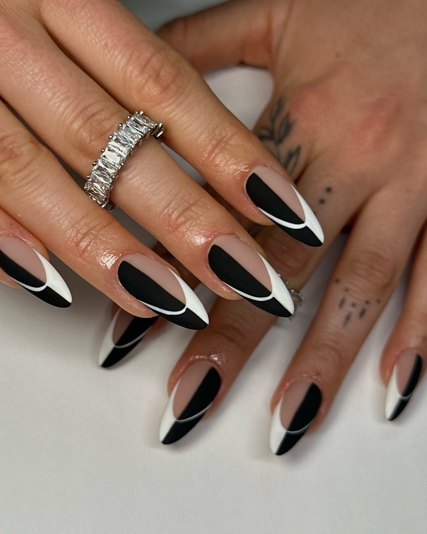 4. Sculpted Matte Noir French Illusion (Black and White Nail Ideas)