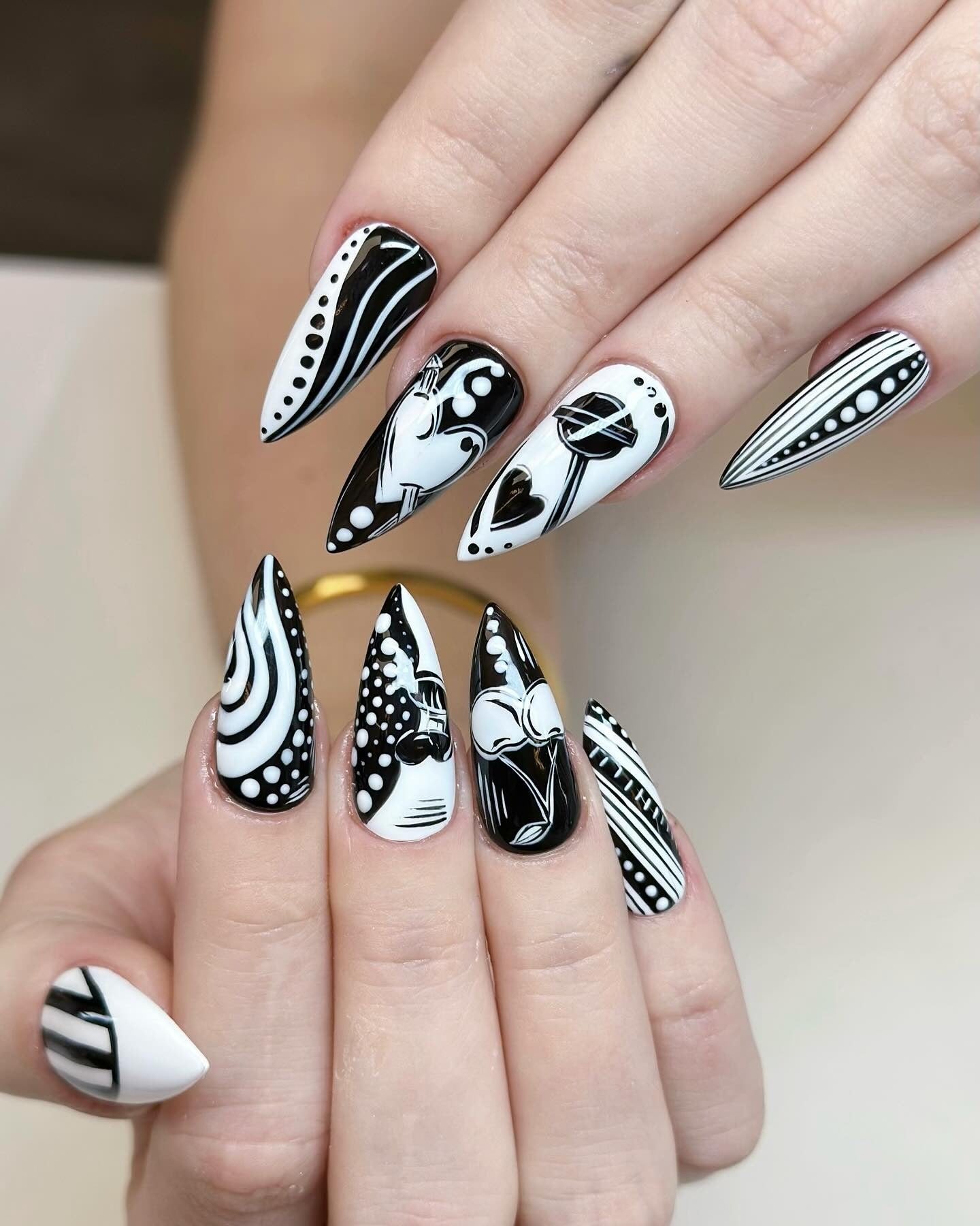 7. Abstract Pop Art Contrast (Black and White Nail Ideas)
