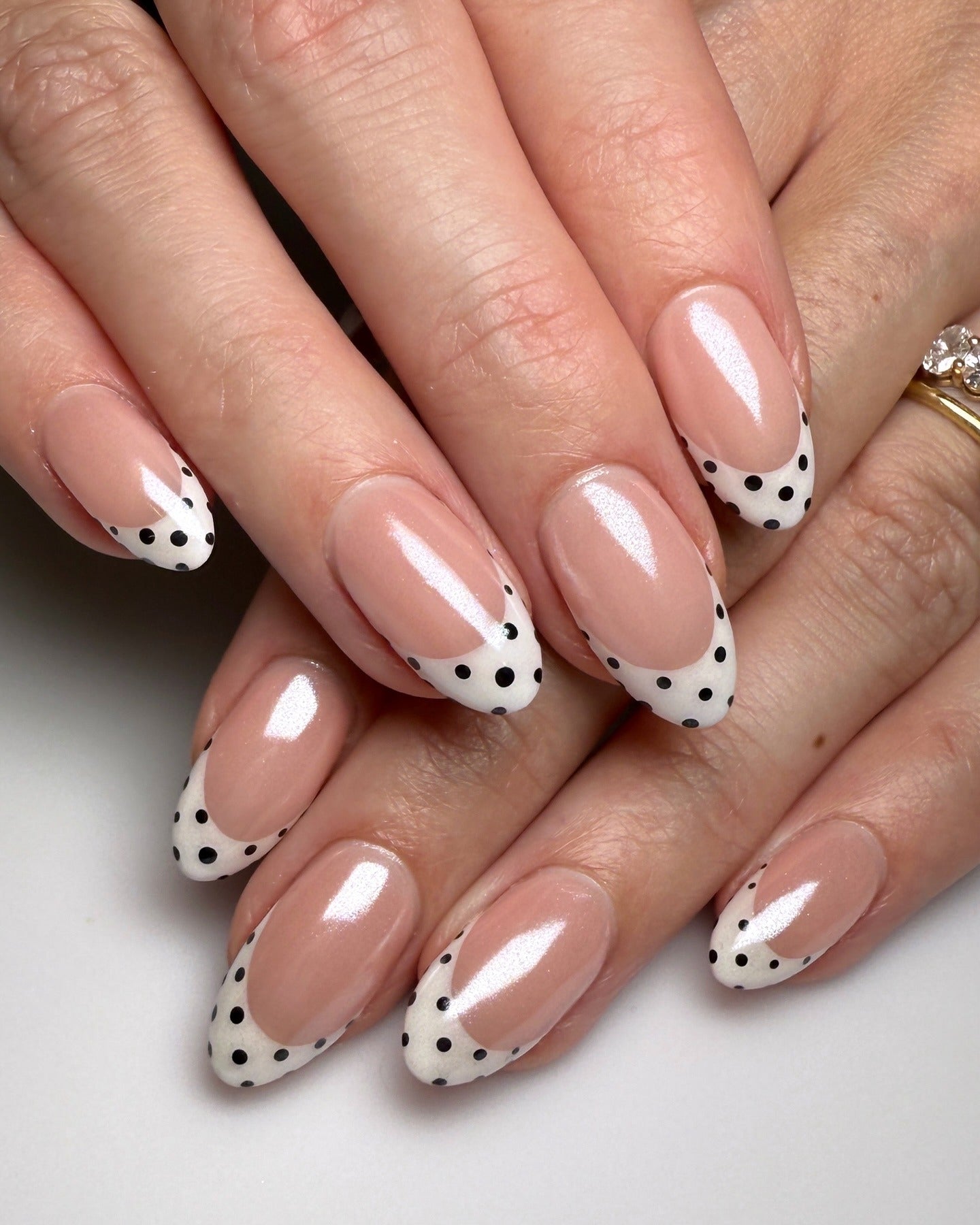 11. French Polka Dot Almond Nails (Black and White Nail Ideas)
