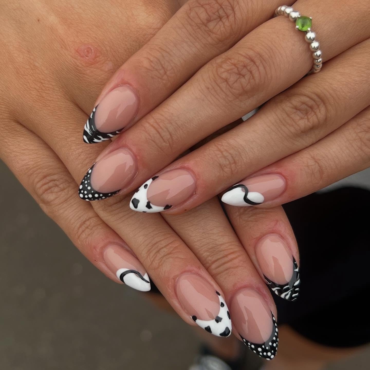 13. Eclectic Tip Mix on Almond Nails (Black and White Nail Ideas)