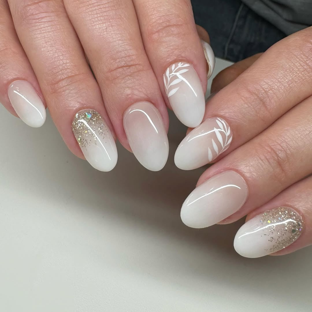 2. Milky White Ombre with Glitter and Leaf Detail (Nail Ideas for Wedding)