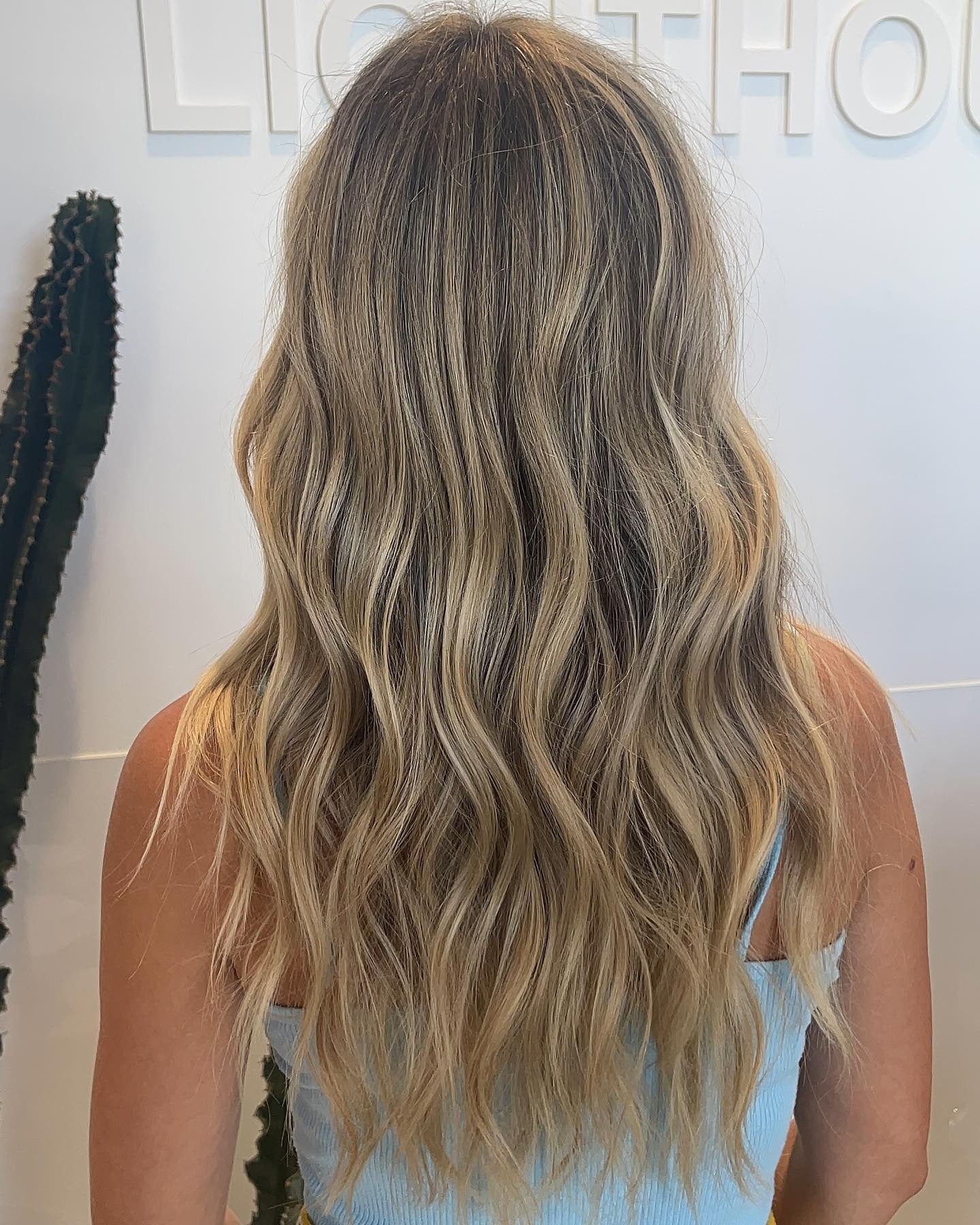 1. Textured Waves with Root Melt Sandy Blonde (Sandy Blonde Hair Color)