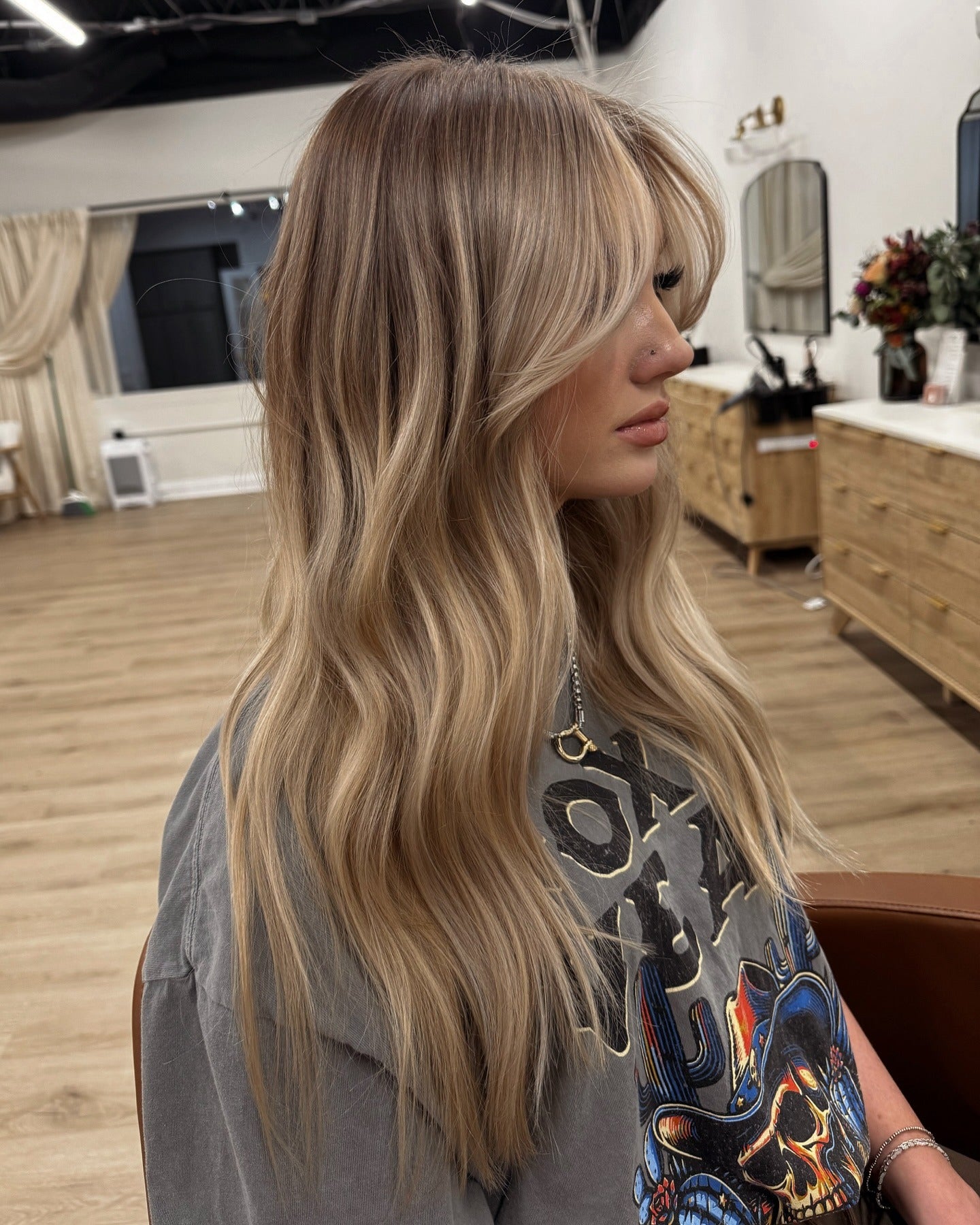 2. Long Curtain Layers with Sandy Beige Blonde (Sandy Blonde Hair Color)