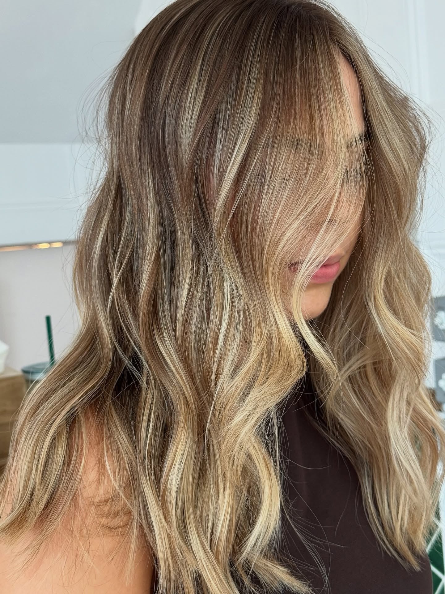 13. Dimensional Sandy Balayage with Wispy Fringe (Sandy Blonde Hair Color)