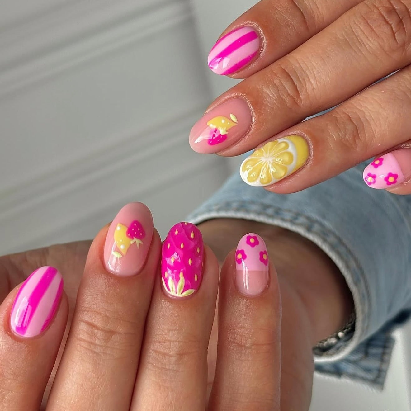 4. Fruit Punch Charm Nails (Yellow and Pink Nail Ideas)