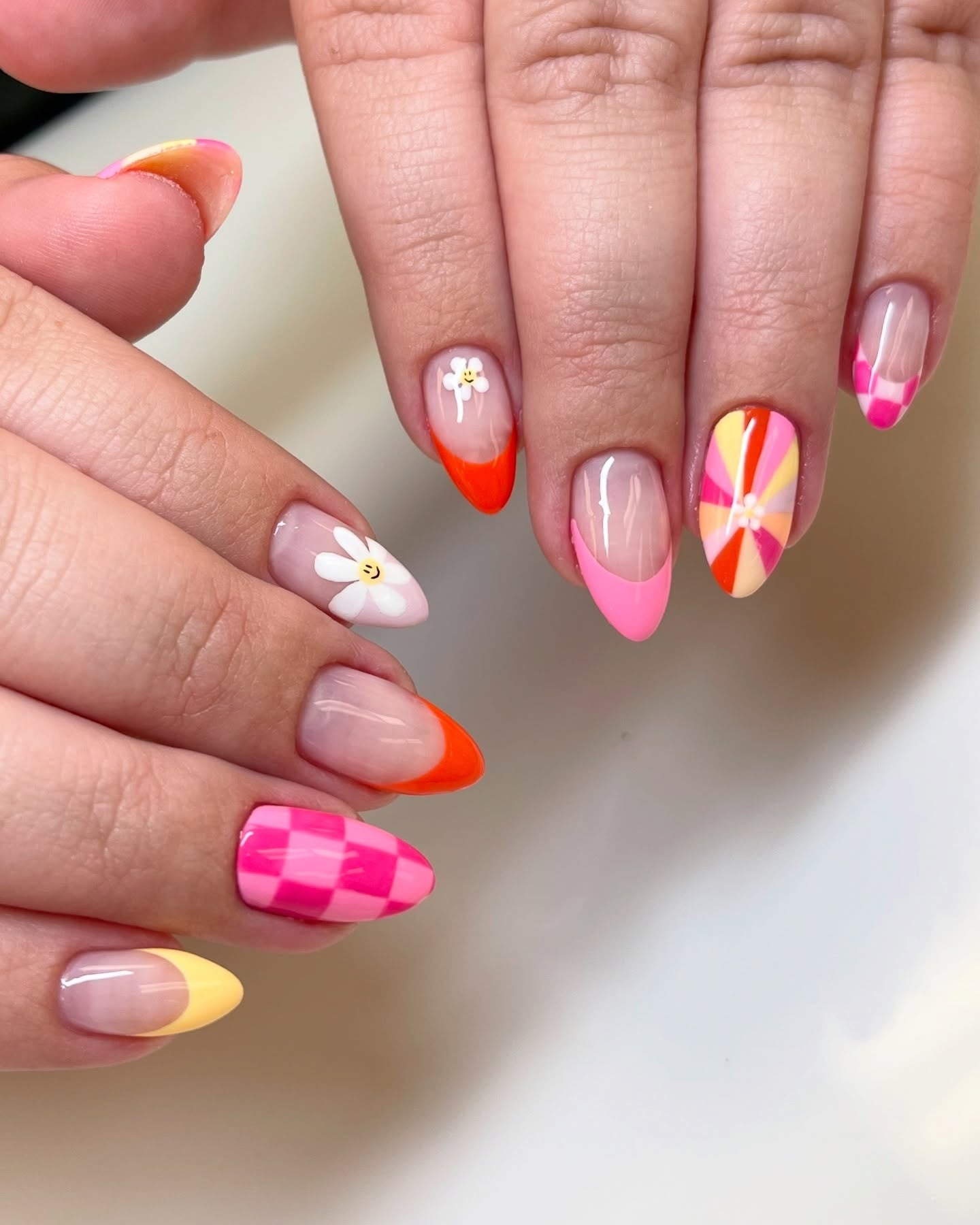 8. Punchy Mix & Match Florals (Yellow and Pink Nail Ideas)