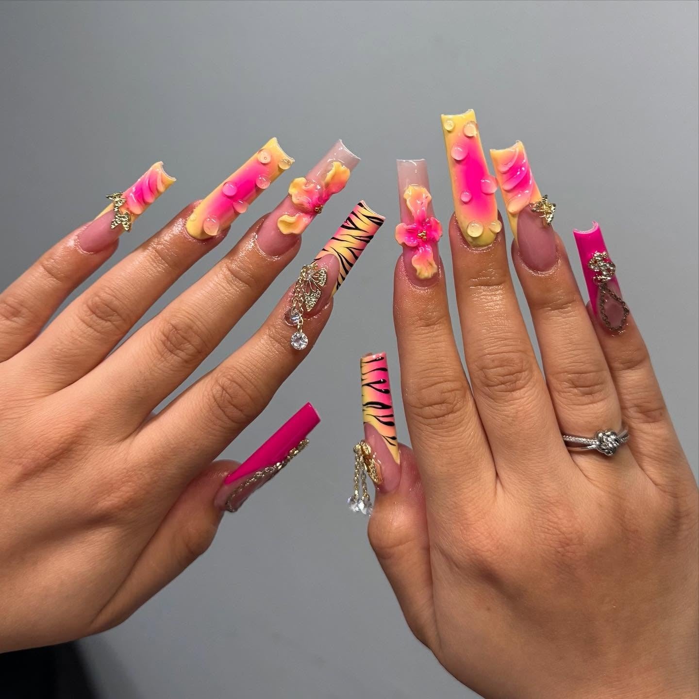 13. Wild Charm Stiletto Extravaganza (Yellow and Pink Nail Ideas)