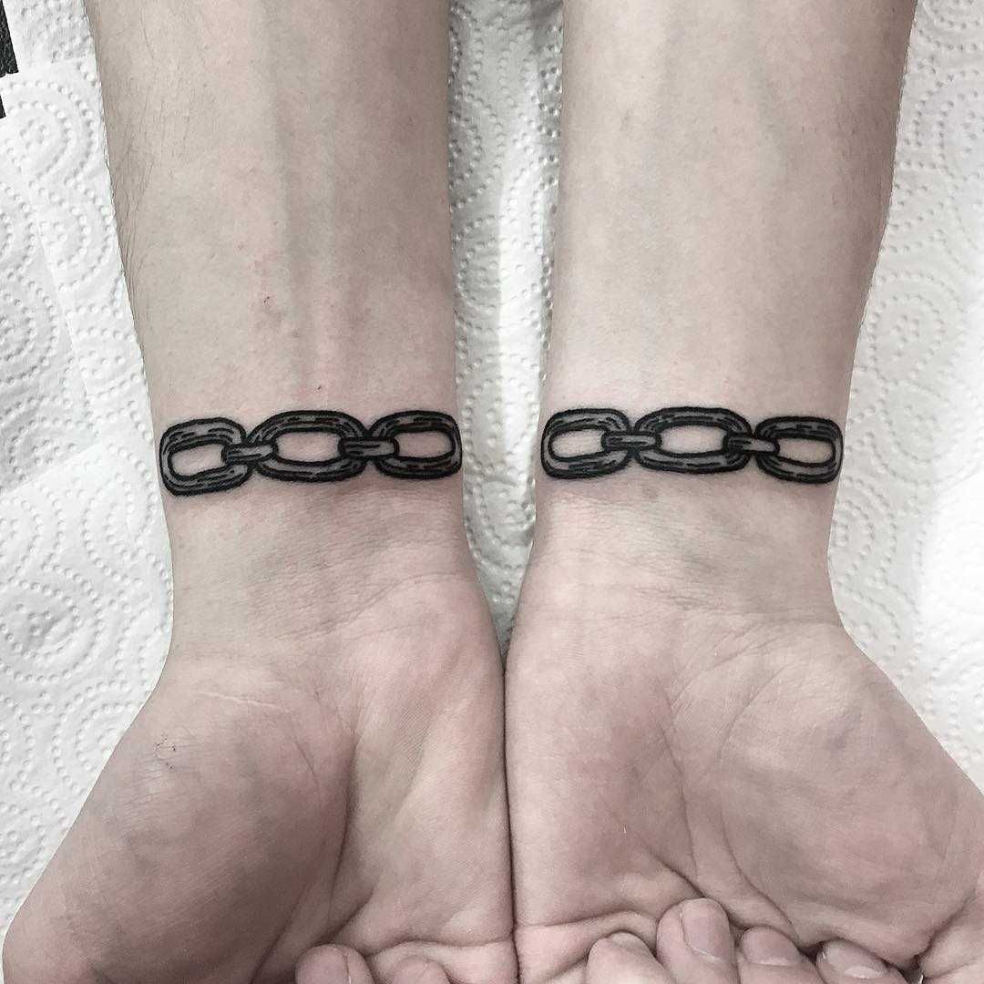 Chain link bracelet tattoos by Deborah Pow - Tattoogrid.net