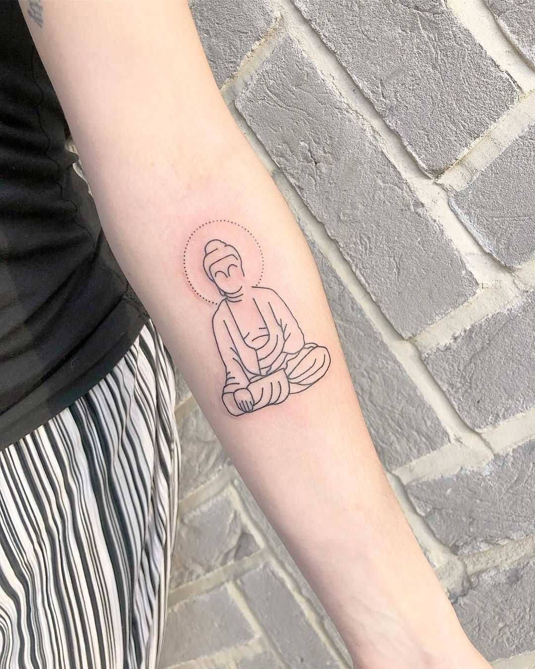 Minimalist Buddha tattoo by Loz Thomas - Tattoogrid.net