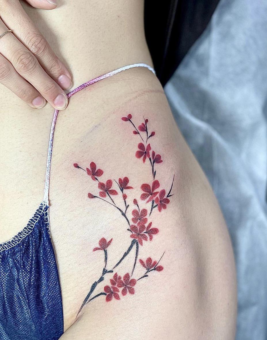 Cherry blossom hip tattoo done by Eiji at Muscat Studio, Tokyo ...