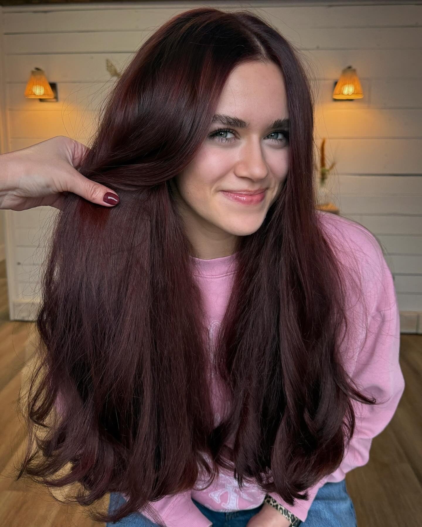 6. Thick Volume Layers with Softly Tousled Finish (Cherry Cola Hair Color)