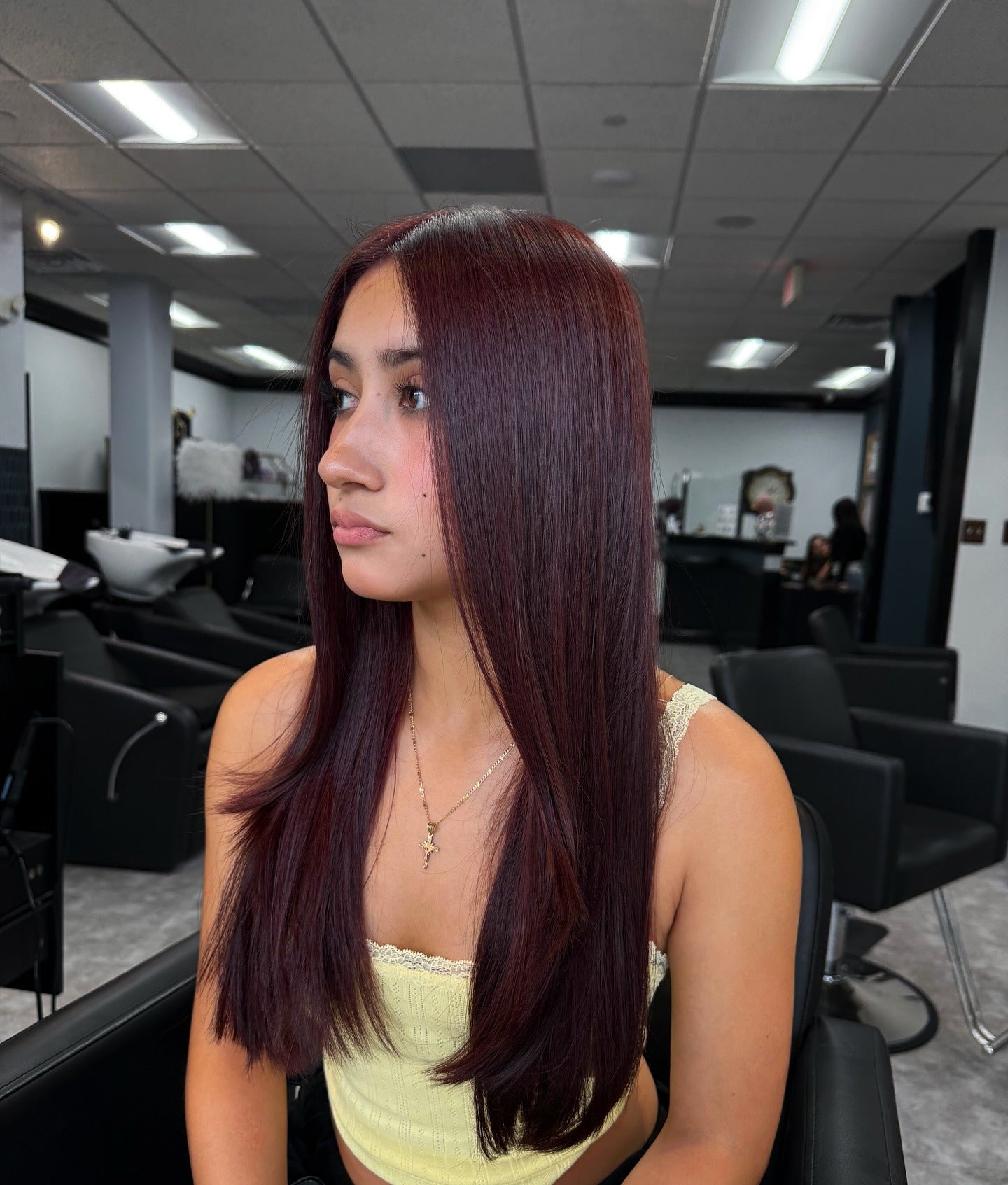 7. Sleek Long Layers with High Shine Cherry Cola (Cherry Cola Hair Color)