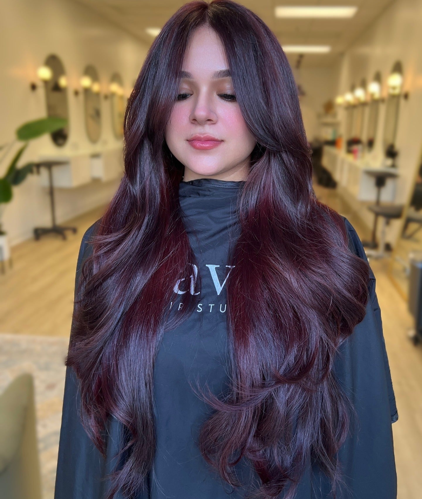 8. High Volume Butterfly Layers with Luxe Cherry Finish (Cherry Cola Hair Color)