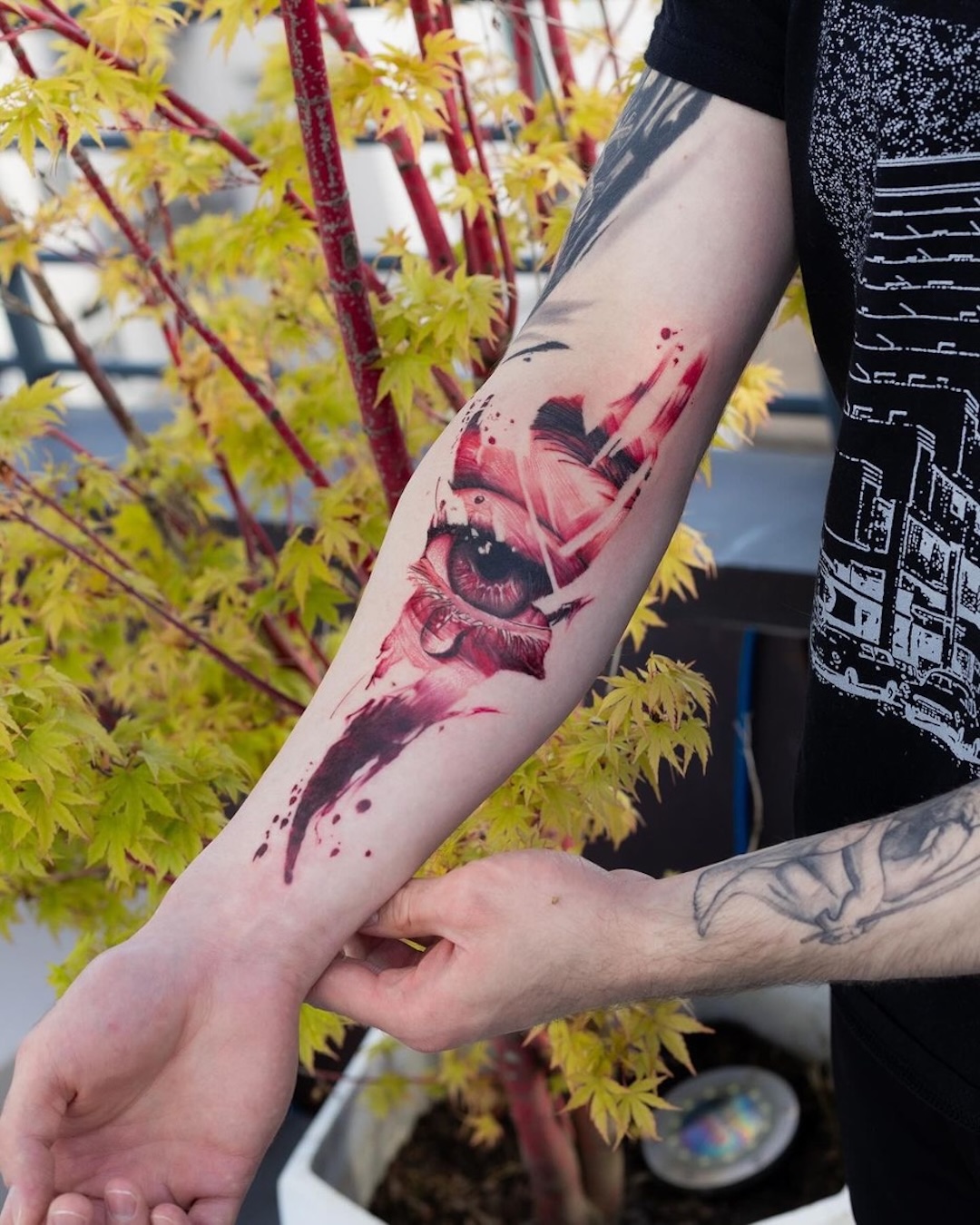 Red Eye Forearm Tattoo