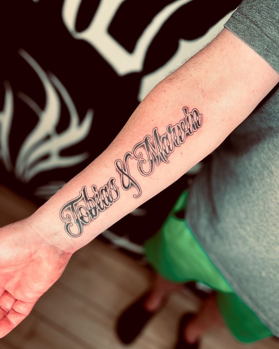 Lettering Forearm Tattoo