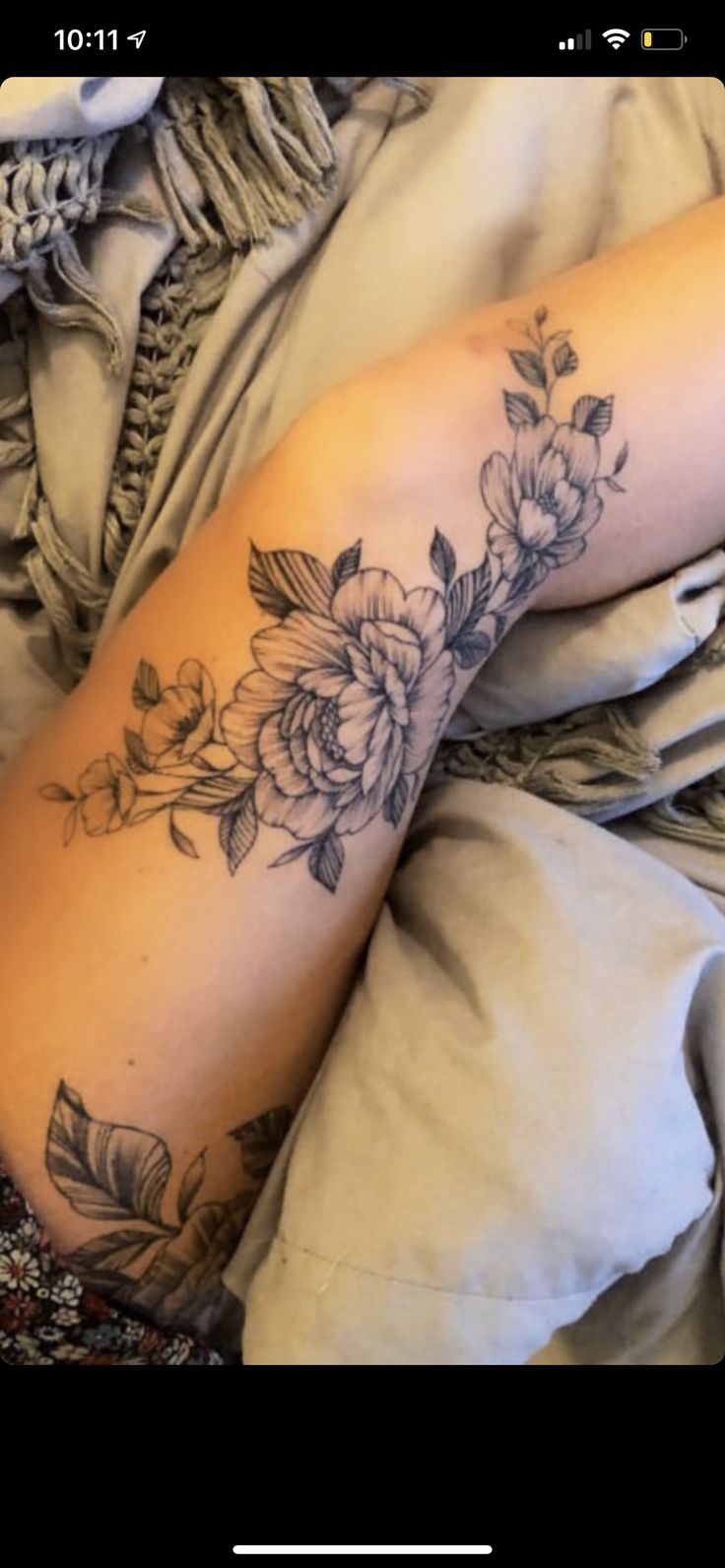 Floral knee tattoo