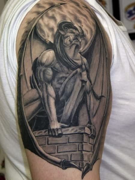 Awesome enormous gargoyle tattoo on shoulder