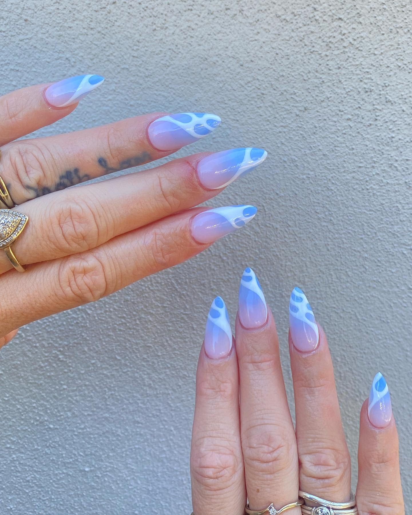 4. Cool Sky Swirls (Pretty Nail Ideas)
