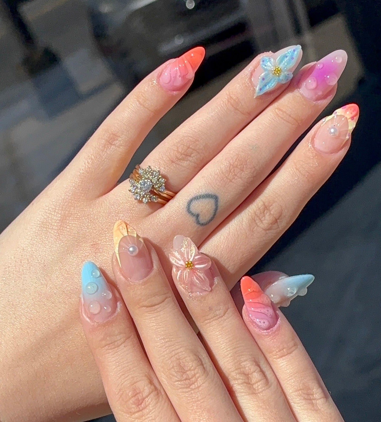 1. Whimsical Butterfly and Coral Gradient Nails (Beach Nail Ideas)
