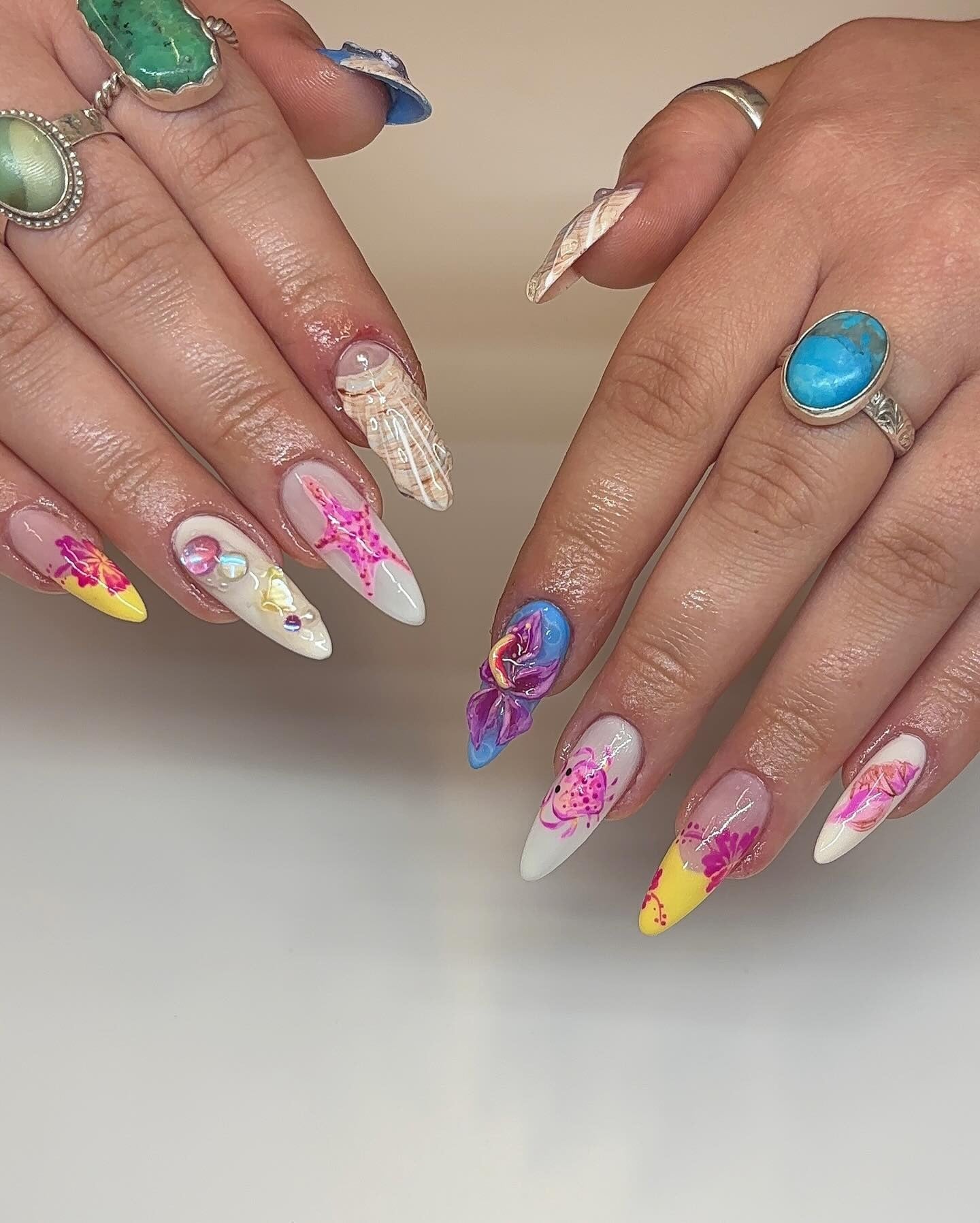 12. Vibrant Tropical Mix and 3D Shell Nails (Beach Nail Ideas)
