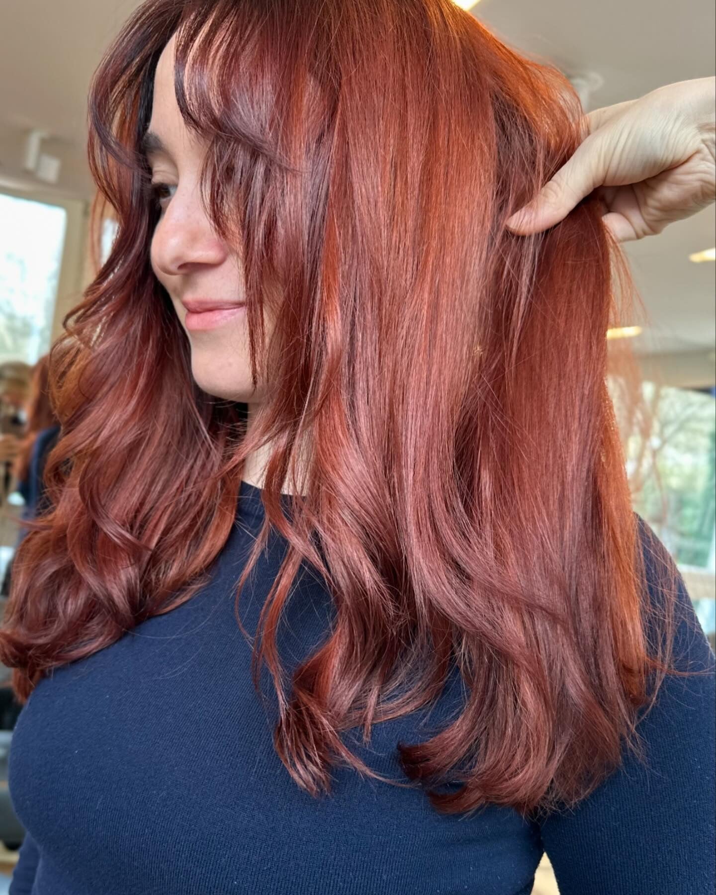 1. Soft Layers with Face-Framing Bangs in Red Copper (Red Copper Hair Color)