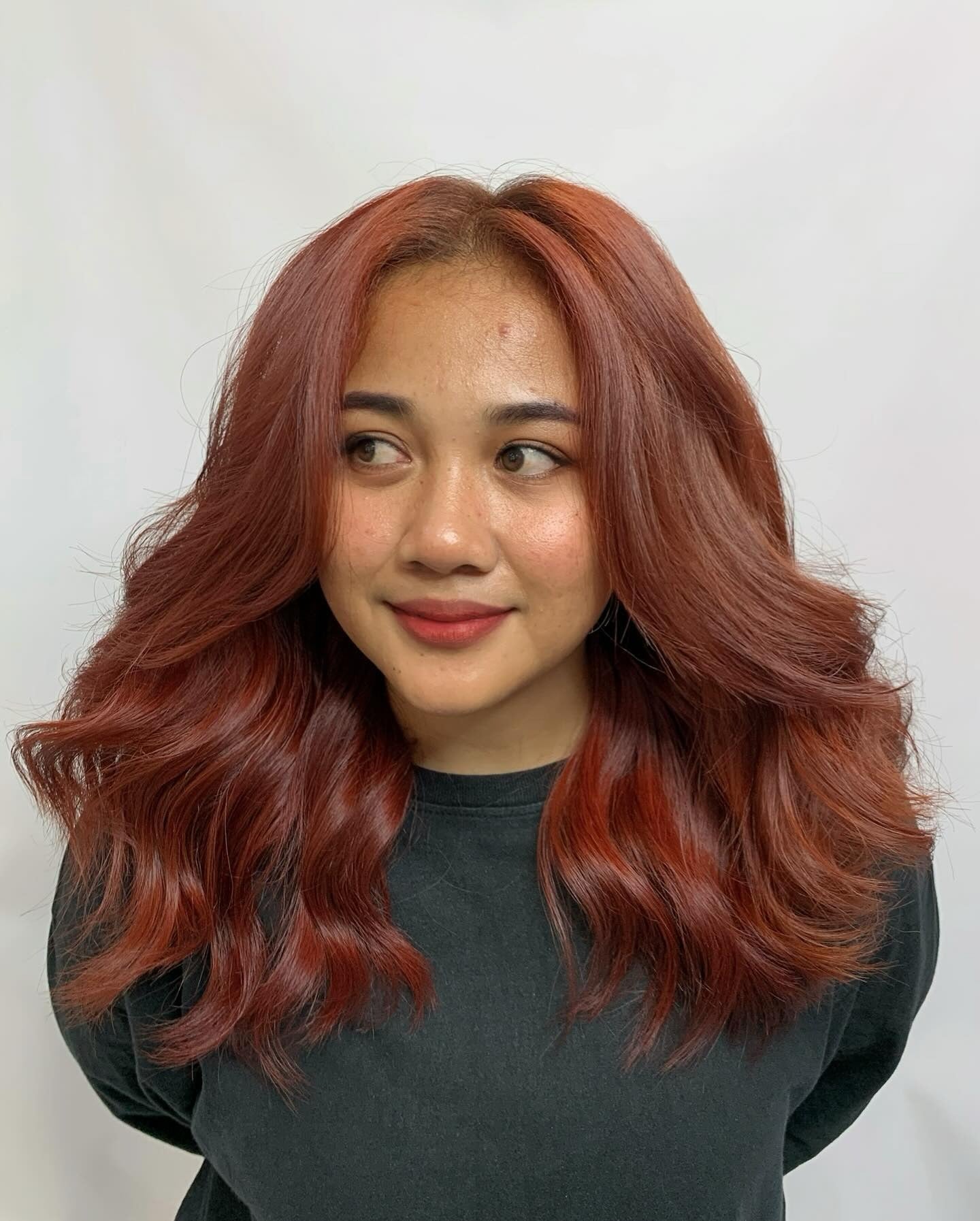 4. Medium-Length Glam Waves in Warm Red Copper (Red Copper Hair Color)
