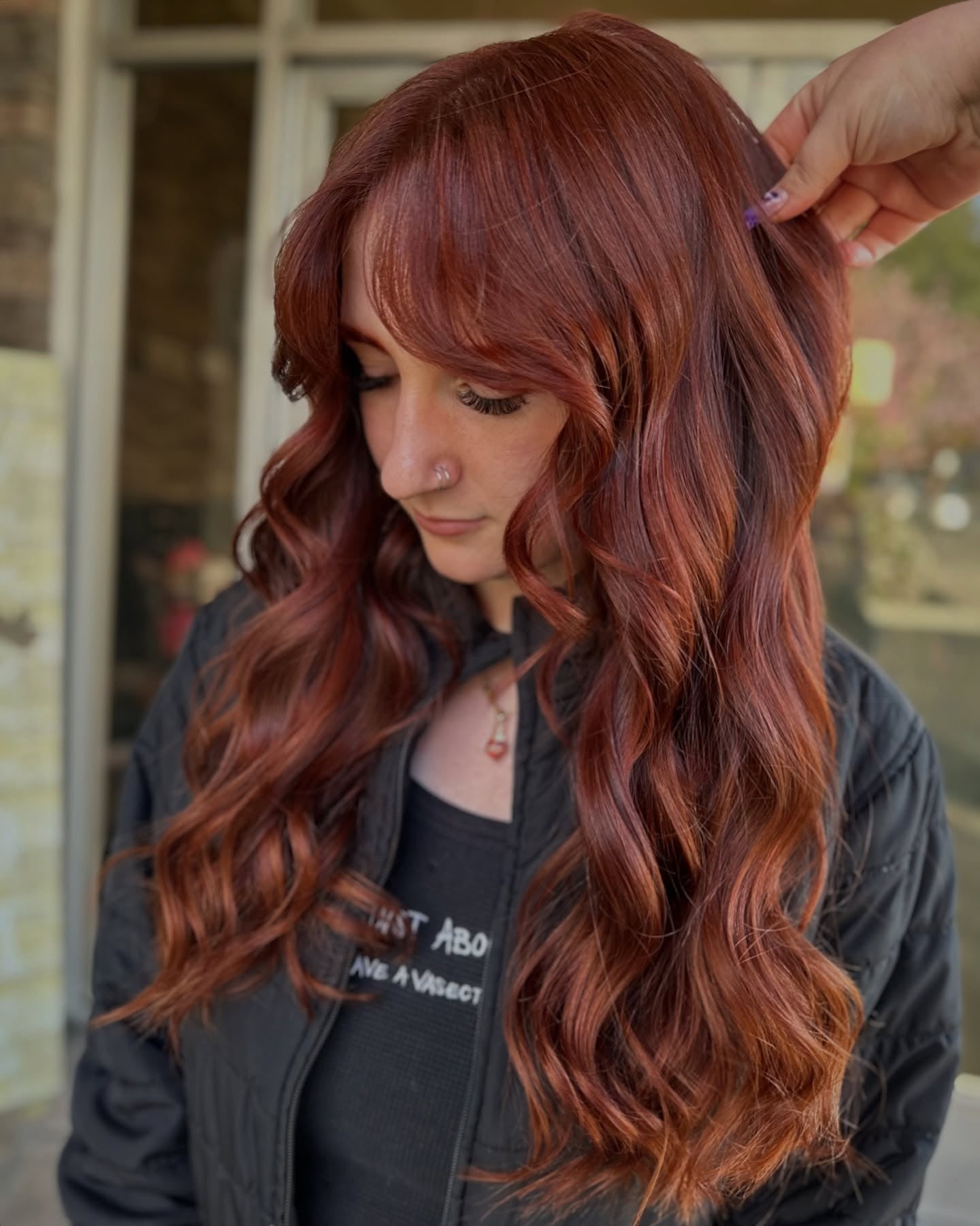 11. Long Copper Waves with Soft Curtain Bangs (Red Copper Hair Color)