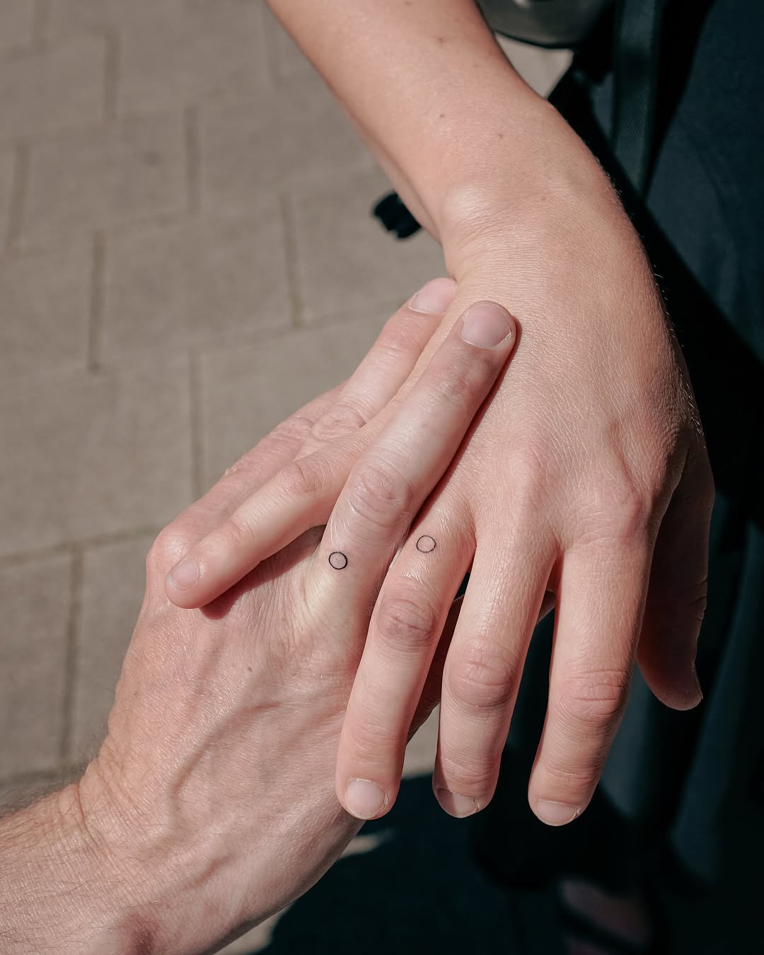Simple circle tattoos for wedding symbolism