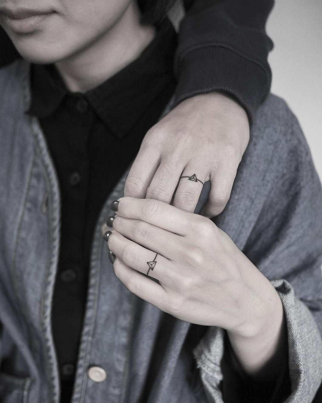 Minimalist wedding ring tattoo for couples