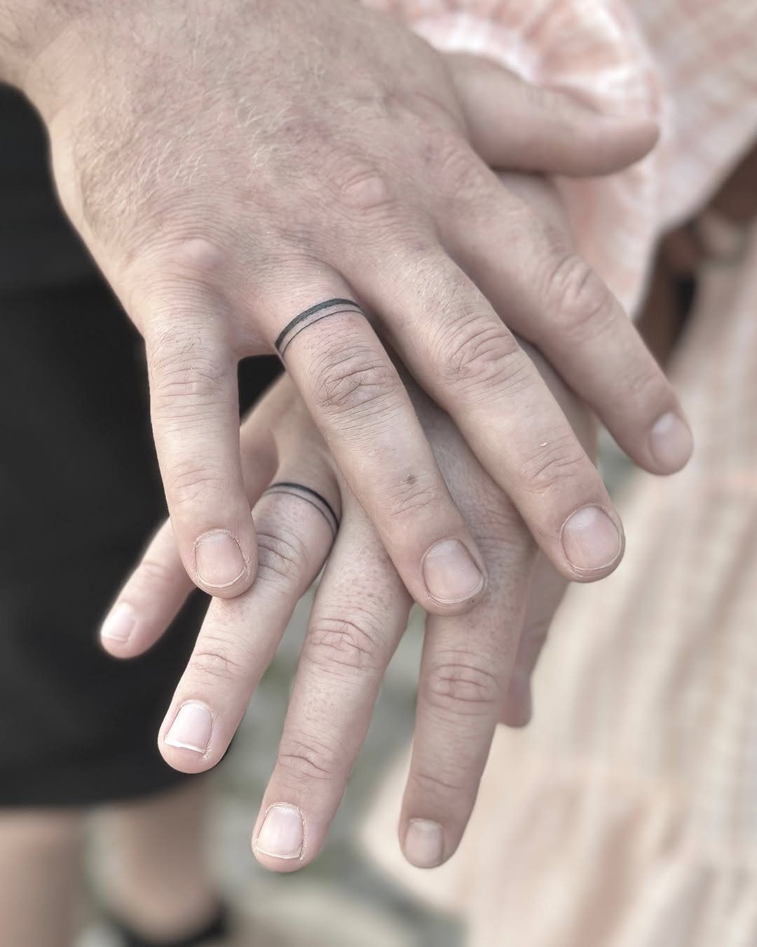 Minimalist tattoo rings for modern couples
