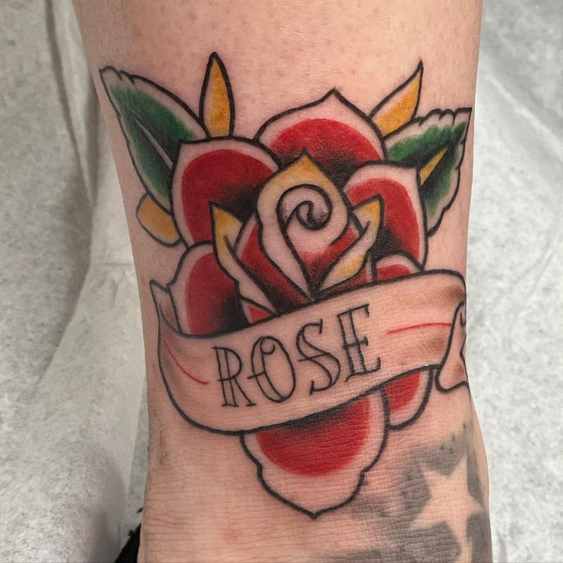 Rose And Name Banner Tattoo