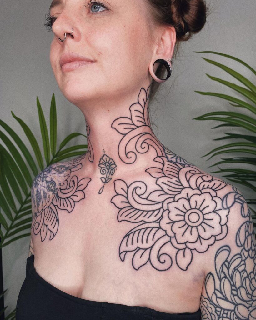  Linework Chest And Neck Tattoo