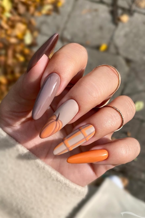 21 Cutest Pumpkin Nails That’ll Make You the It-Girl of Spooky Season