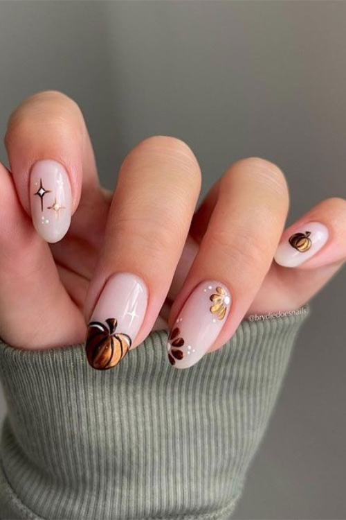 21 Cutest Pumpkin Nails That’ll Make You the It-Girl of Spooky Season