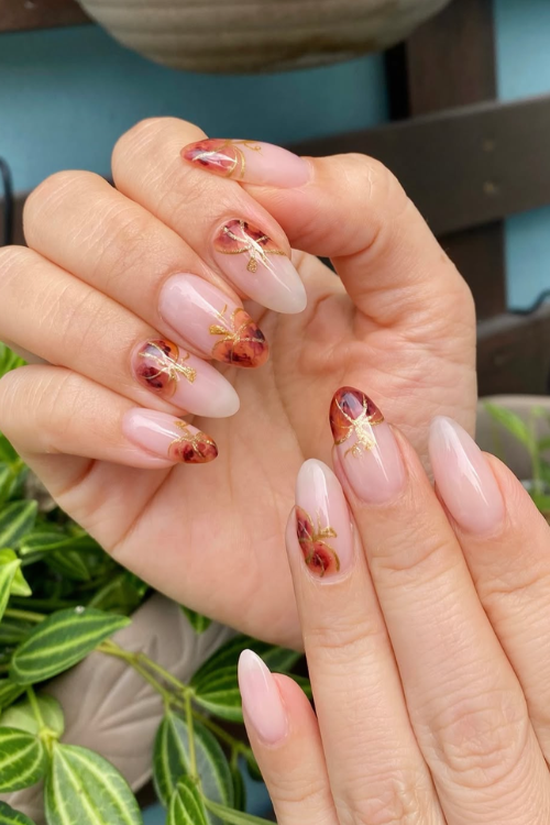 21 Cutest Pumpkin Nails That’ll Make You the It-Girl of Spooky Season
