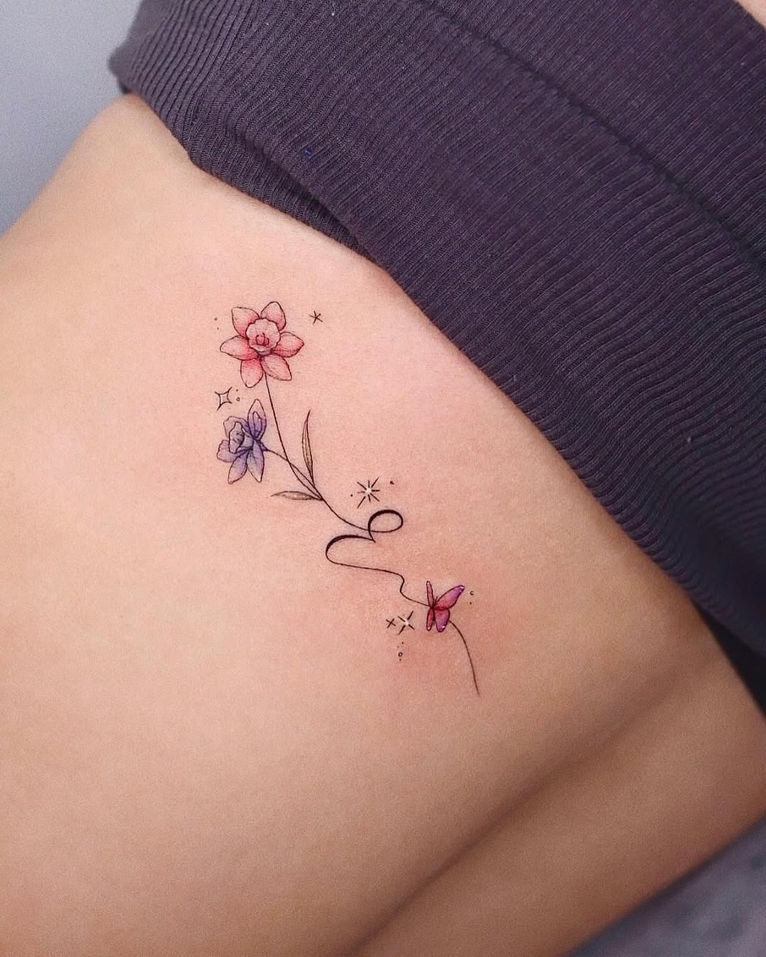 Charming Floral Initials Tattoo Design