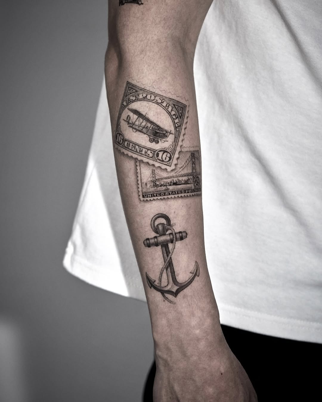 Stylish anchor tattoo with vintage motifs