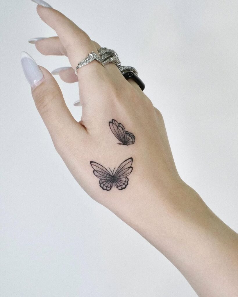 Little Butterflies Hand Tattoo