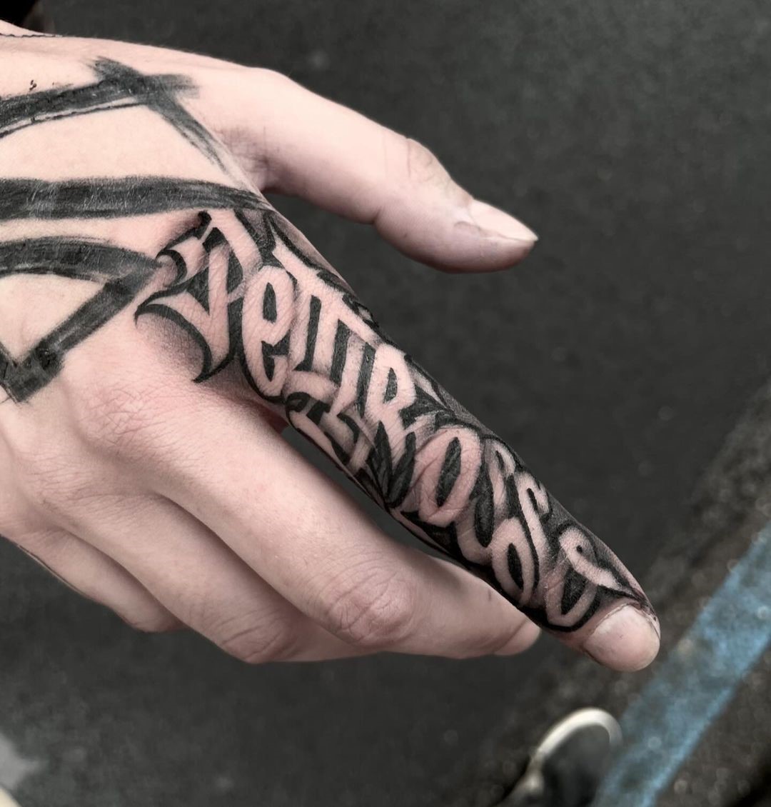 One Word One Finger Tattoo