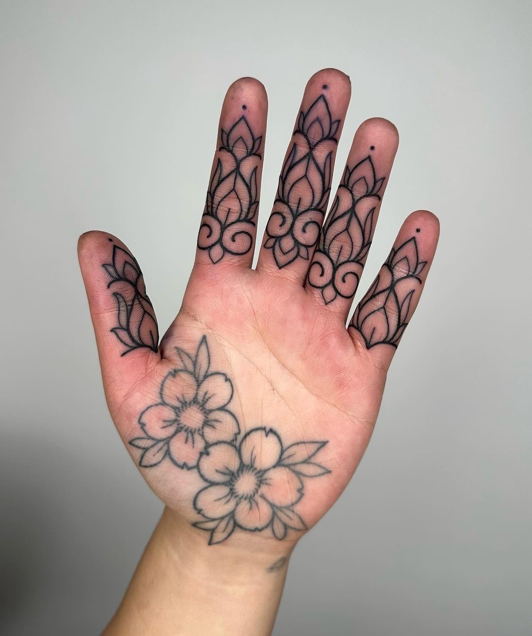 Finger And Palm Tattoo