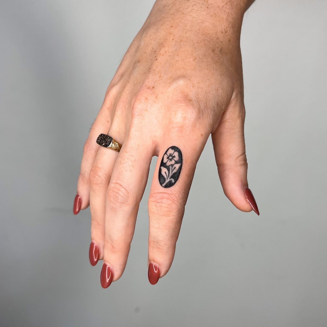 Floral Ornament Finger Tattoo