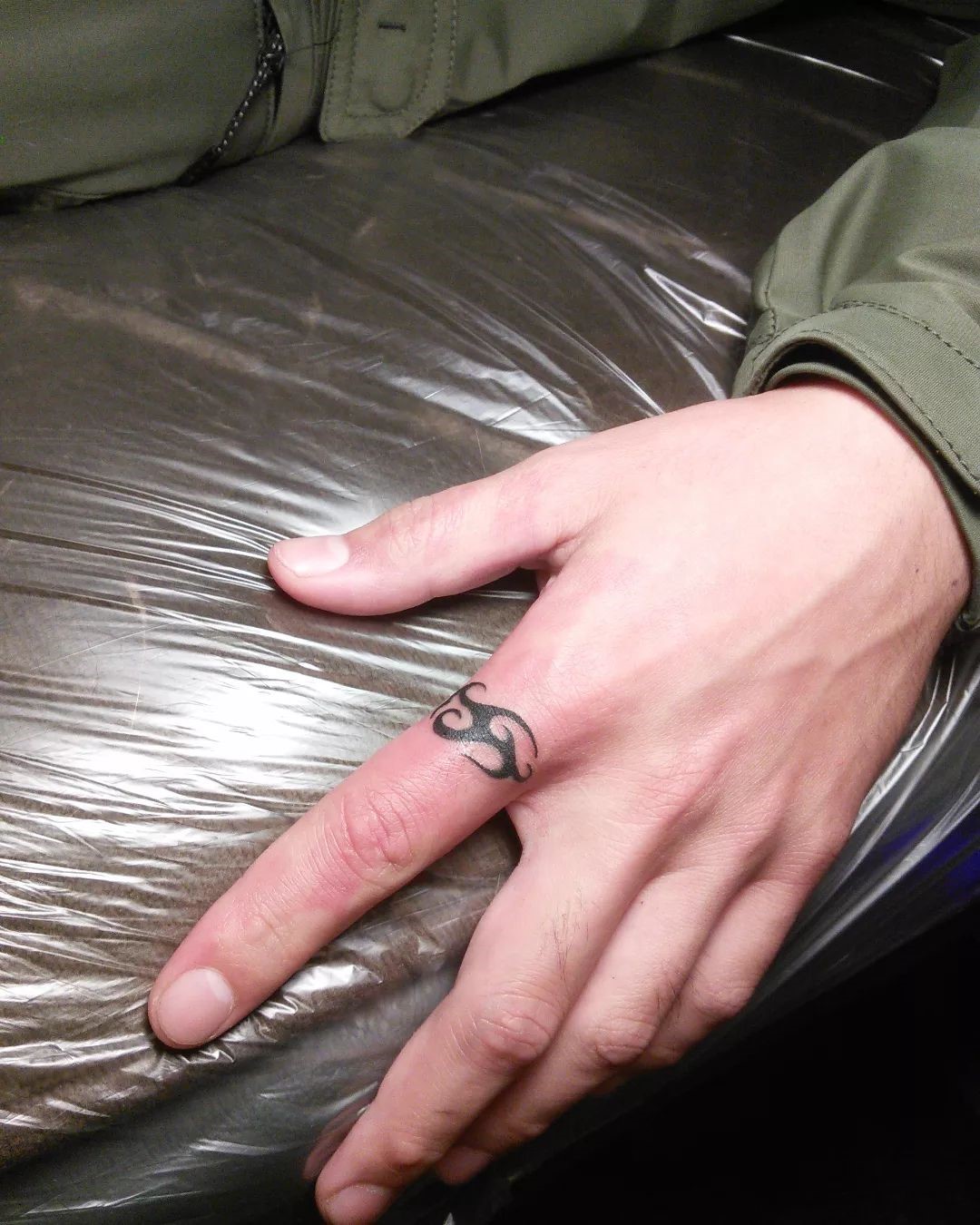 Tribal Finger Tattoo