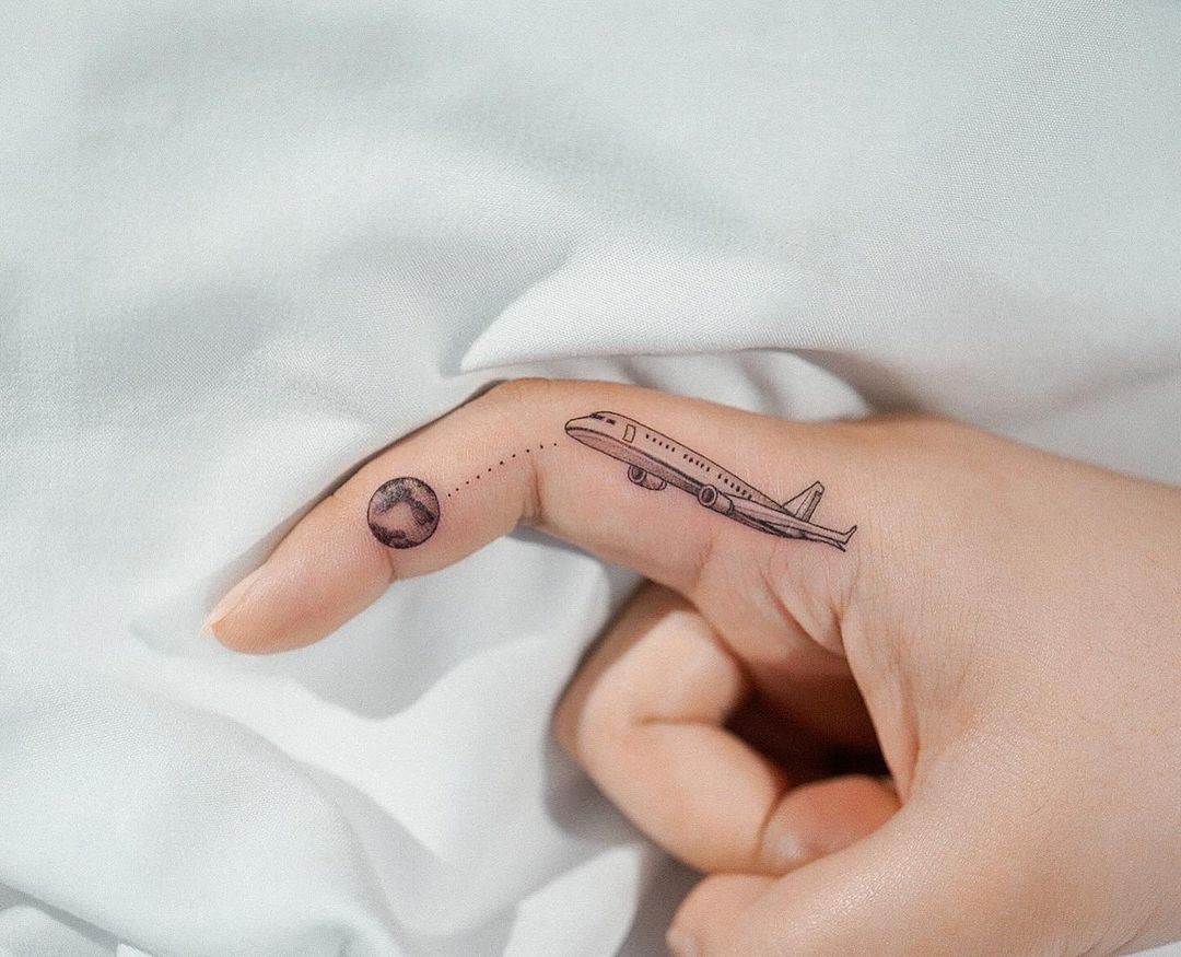 Finger Tattoo For Travel Lovers
