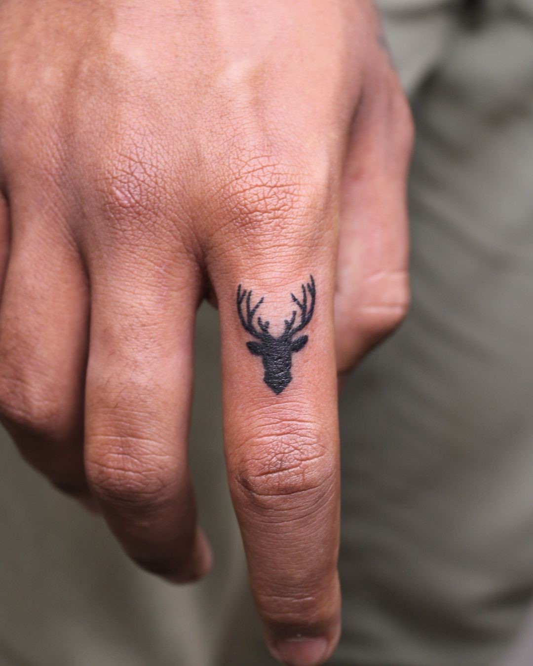 Deer Finger Tattoo