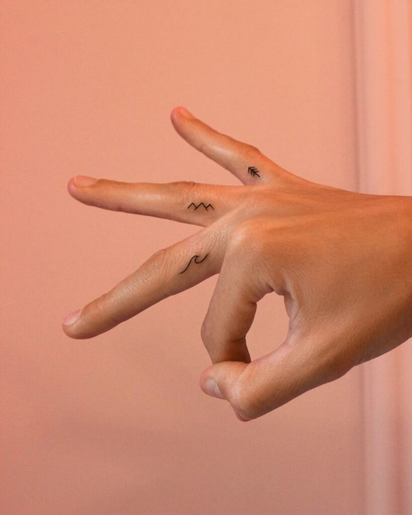 Minimalist Finger Tattoo